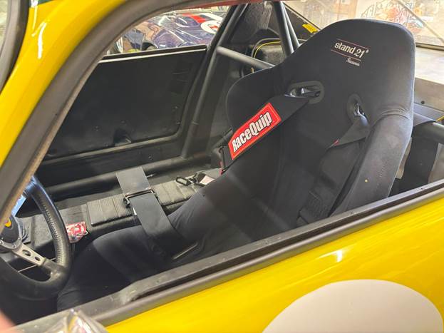 A seat of a race car

AI-generated content may be incorrect.